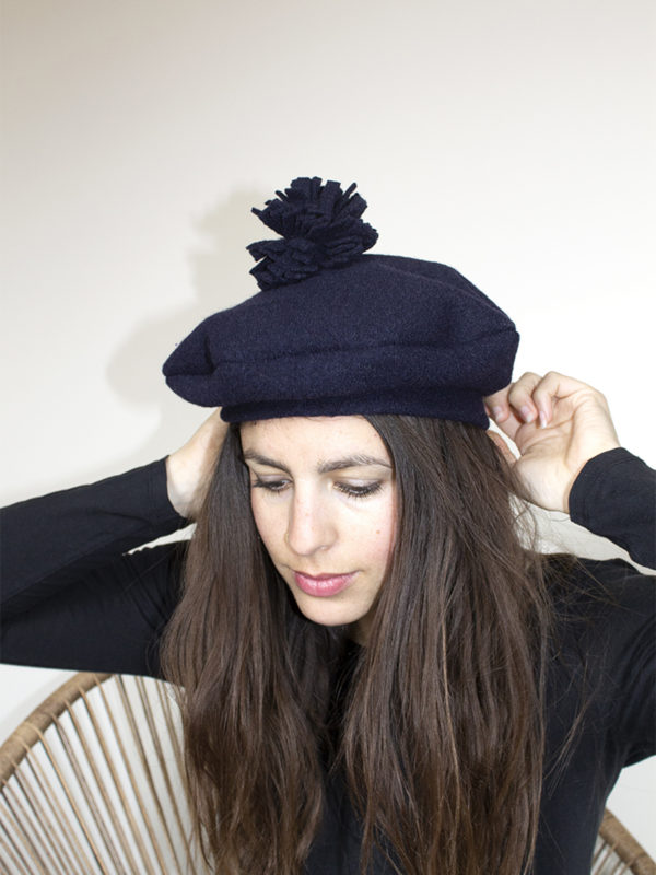 midnight blue beret with pom-pom