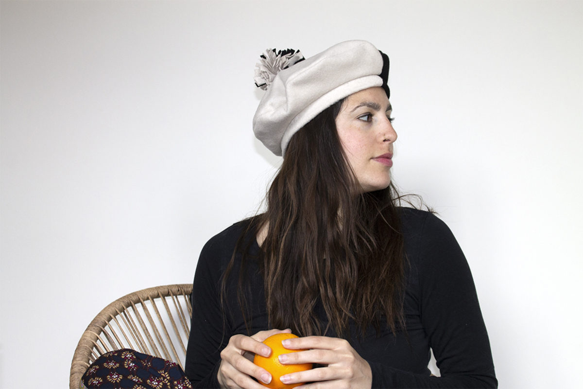 bicolour black and white beret with pom-pom