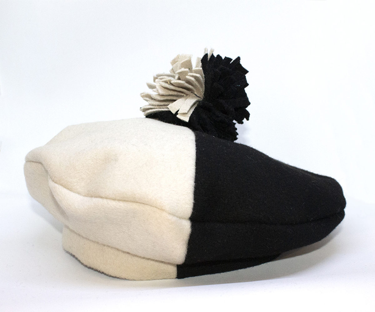 bicolour black and white beret with pom-pom