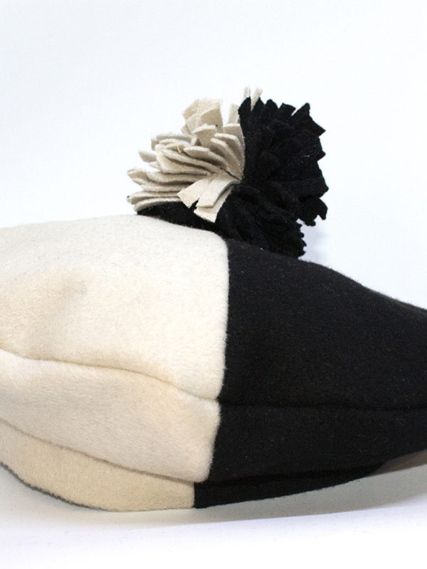 bicolour black and white beret with pom-pom