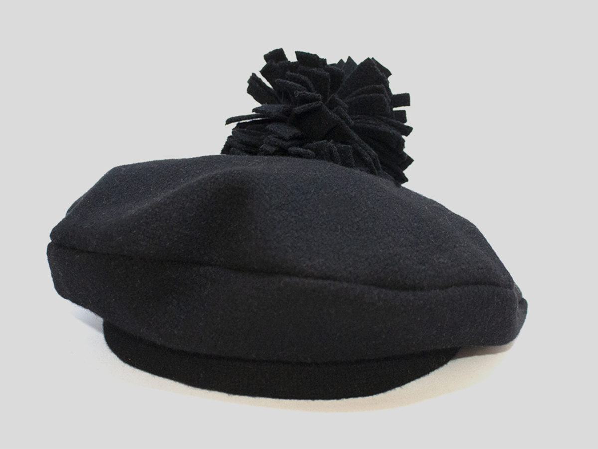 Black beret with pom-pom